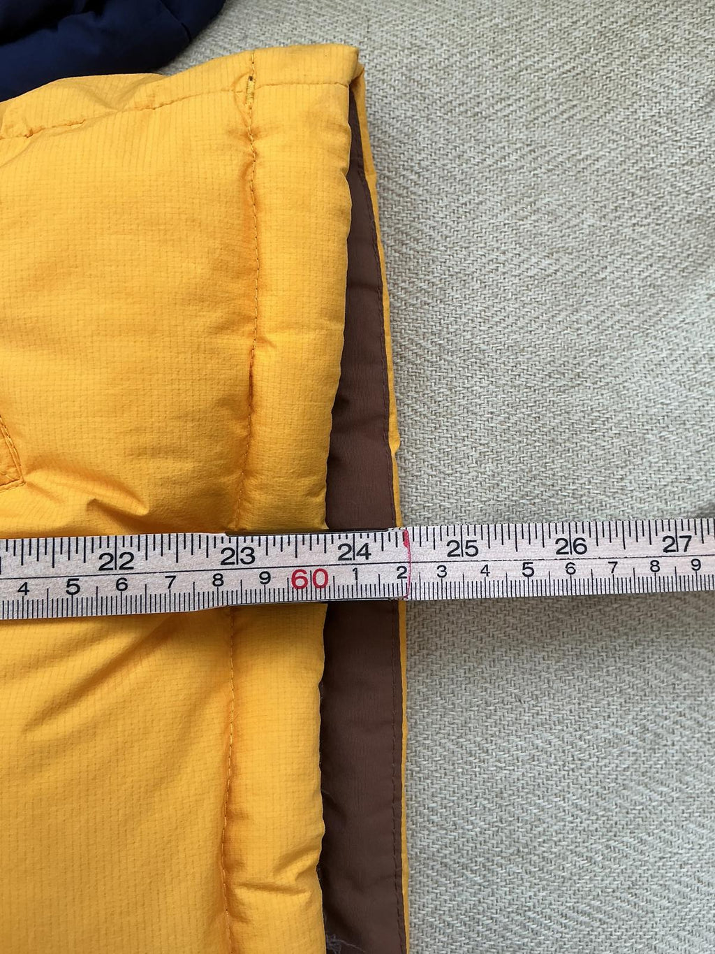 The North Face ladies Yellow and Brown Puffer Jacket with Hood