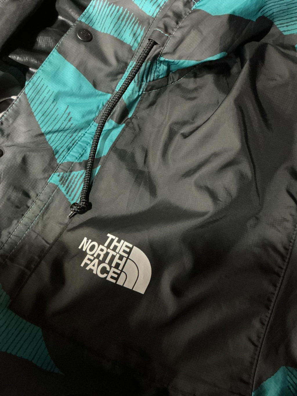 The North Face Men's Windbreaker Jacket 30 year edit Black and Teal Camouflage