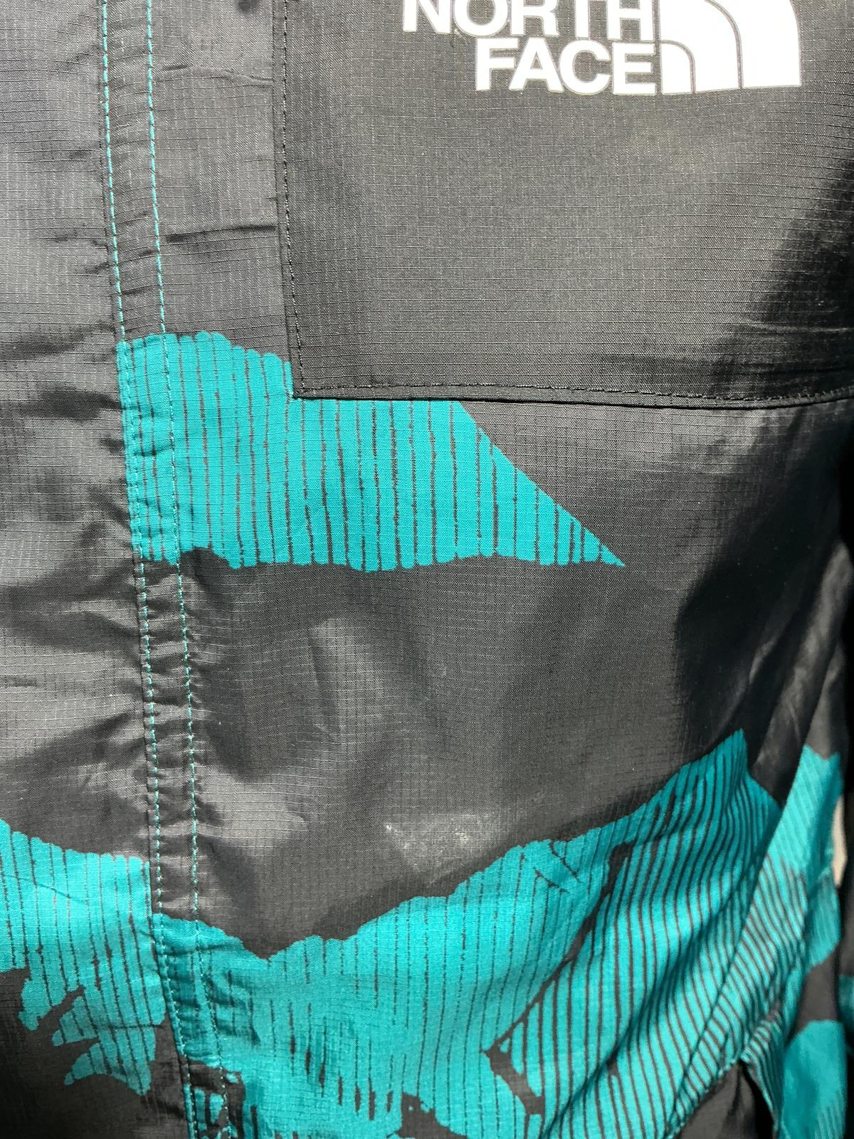 The North Face Men's Windbreaker Jacket 30 year edit Black and Teal Camouflage