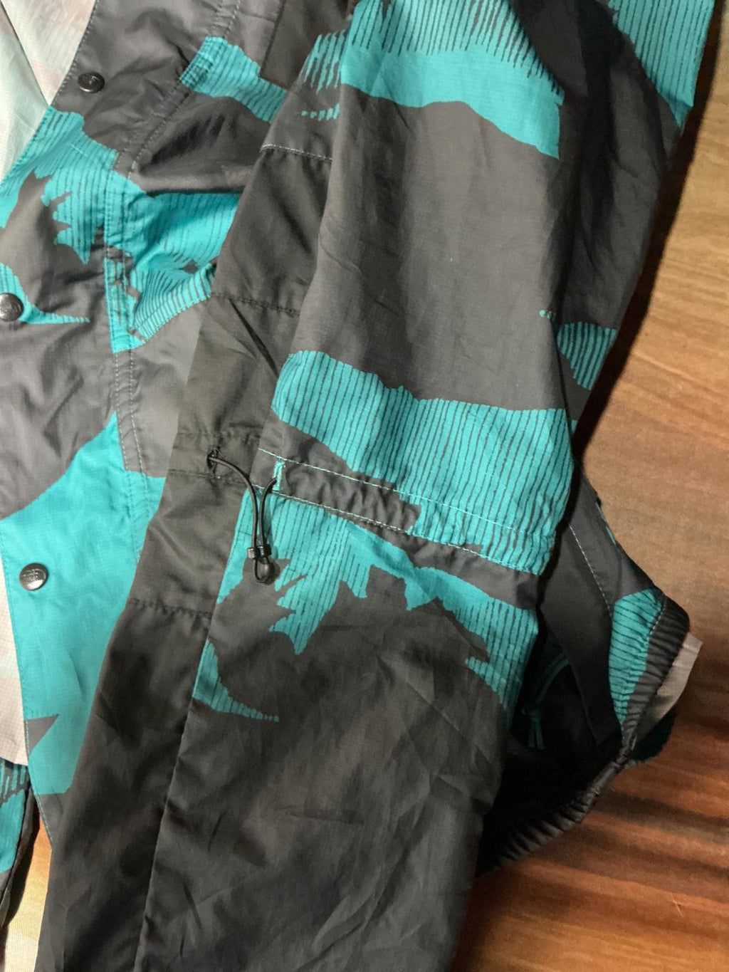 The North Face Men's Windbreaker Jacket 30 year edit Black and Teal Camouflage